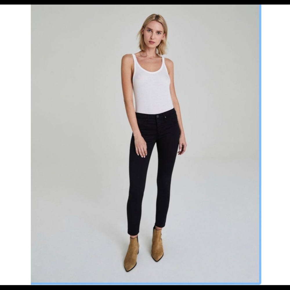 AG Jeans the legging ankle with step hem raw edge in black. Size 28.